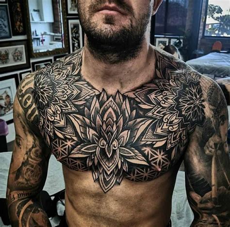 pretty chest tattoos|mandala chest tattoo male.